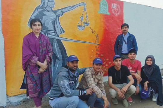 The fine arts team of IUB won the second position in the NAB Multan Wall Painting Competition